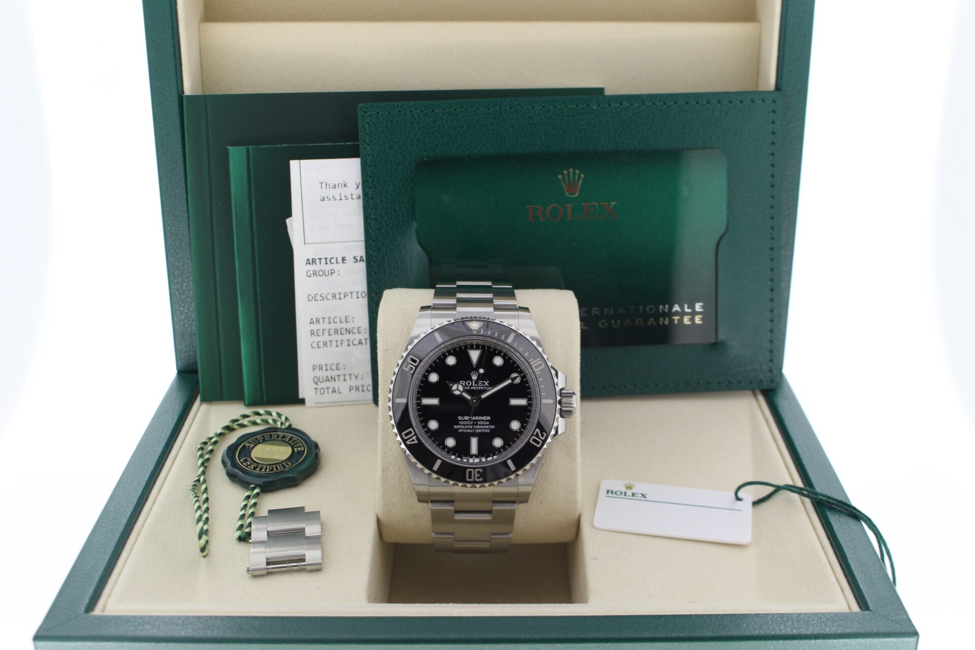 Rolex Submariner No Date 124060 in it's box with both swing tags, original purchase receipt, booklets and warranty card