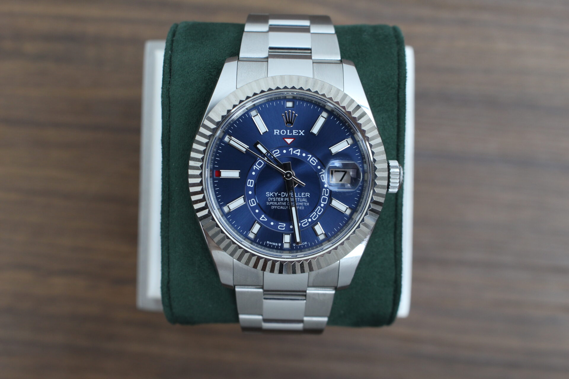 Rolex Sky-Dweller Blue Dial 336934 on a green cushion