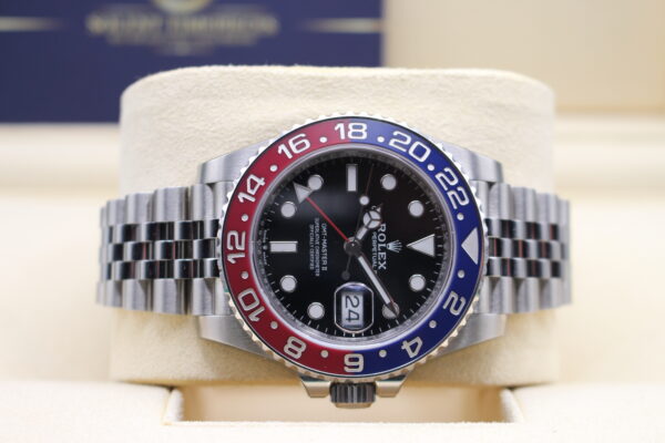 Rolex GMT Master II Pepsi laid on its side crown side down