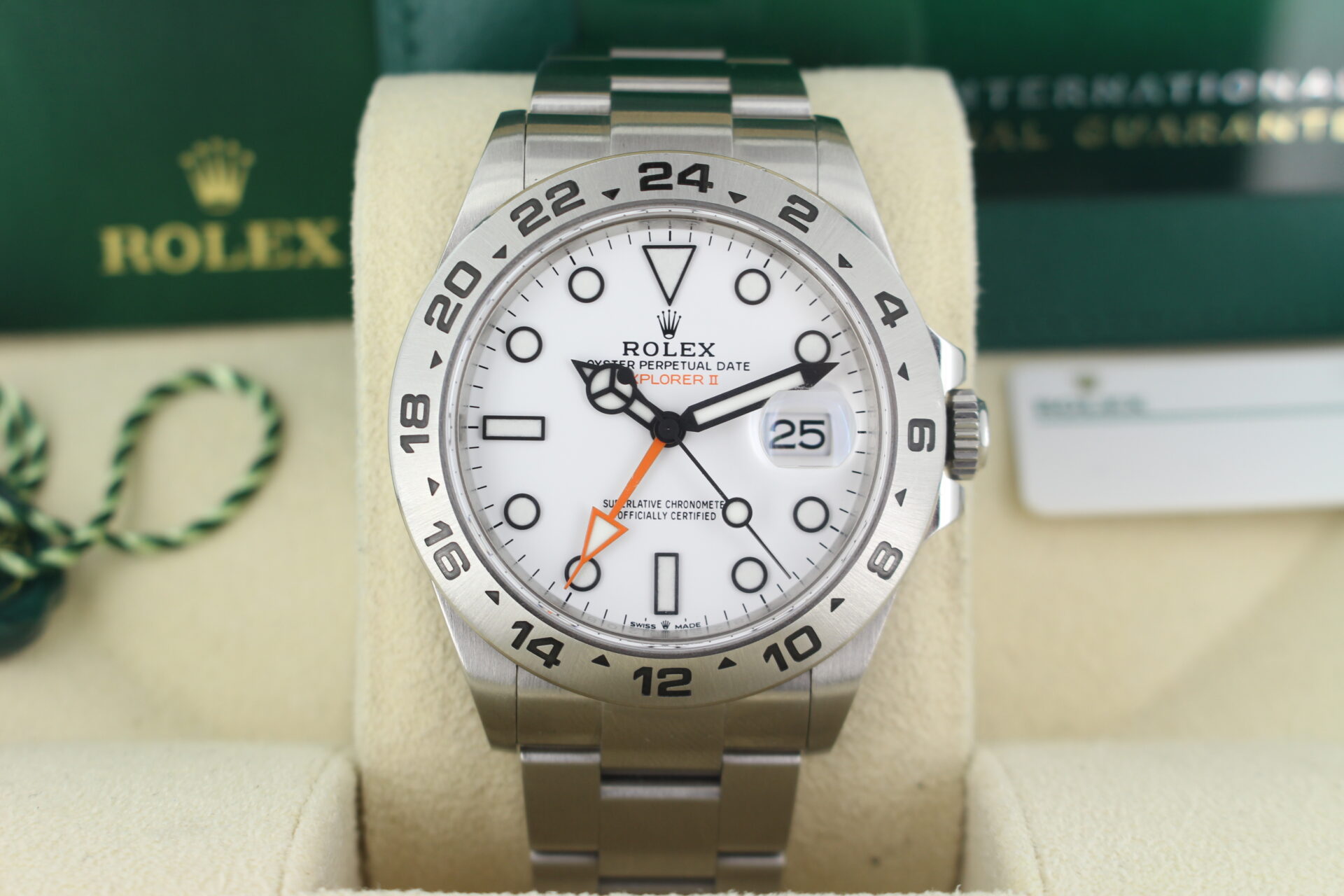 Close up of Rolex Explorer II Polar 226570 in it's box with both swing tags, booklets and warranty card