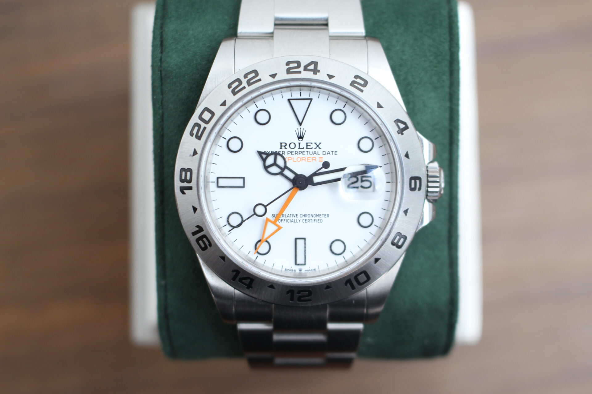 Rolex Explorer II Polar 226570 on a green cushion