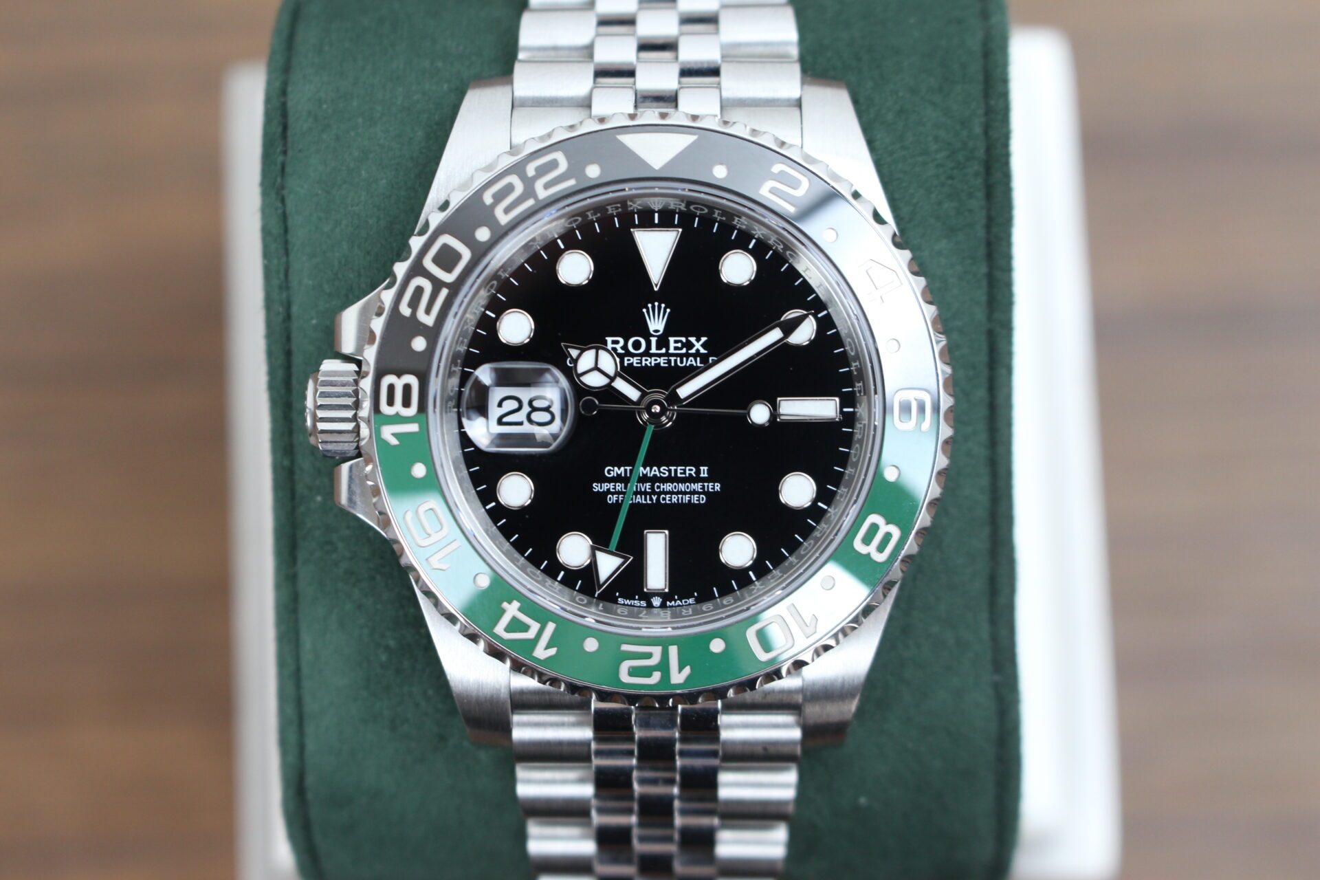 Rolex GMT Master II Sprite 126720VTNR on a green cushion