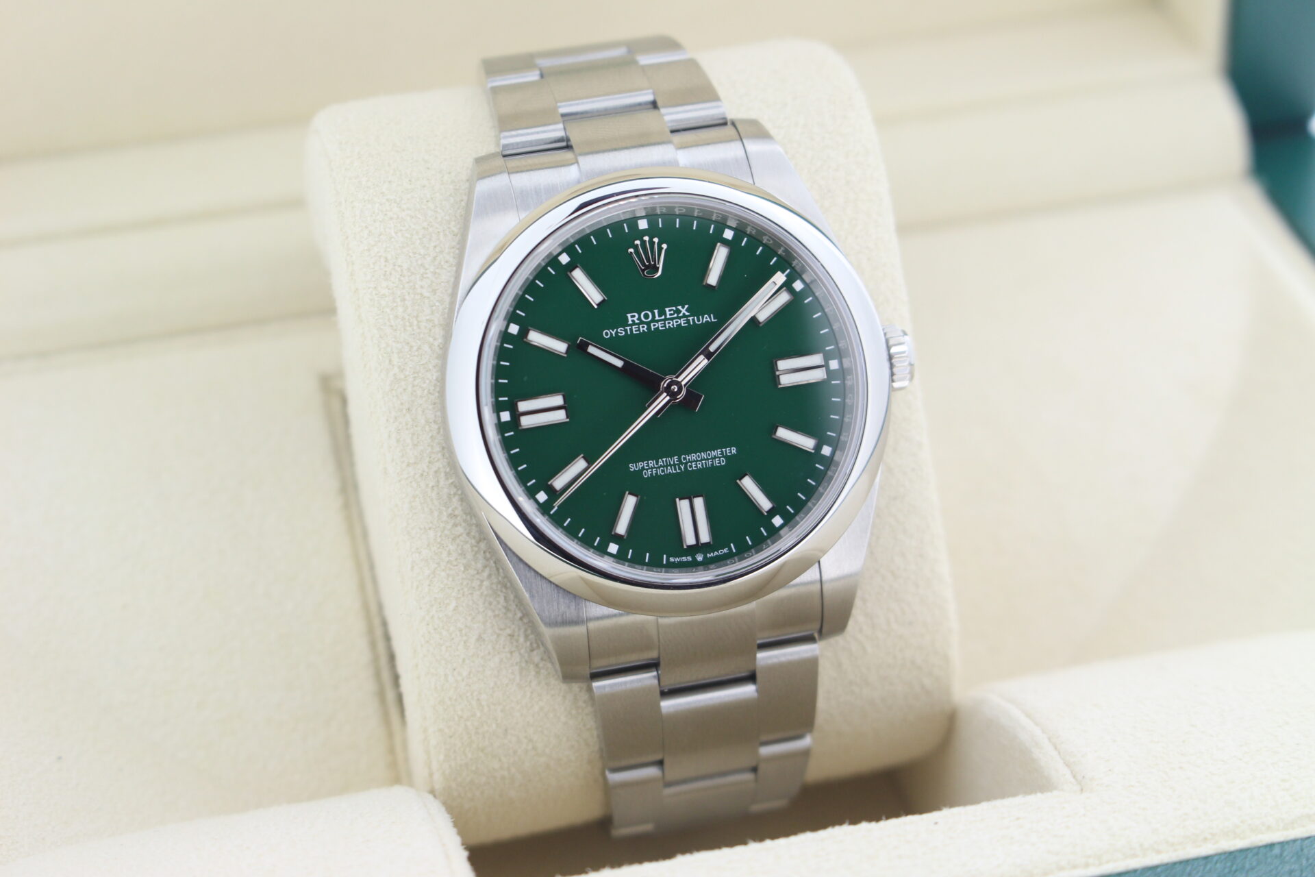 Rolex Oyster Perpetual 41 Green 124300 facing towards the right to show the left angle