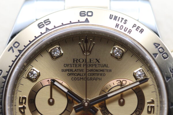 Close up of Rolex logo and diamond dial