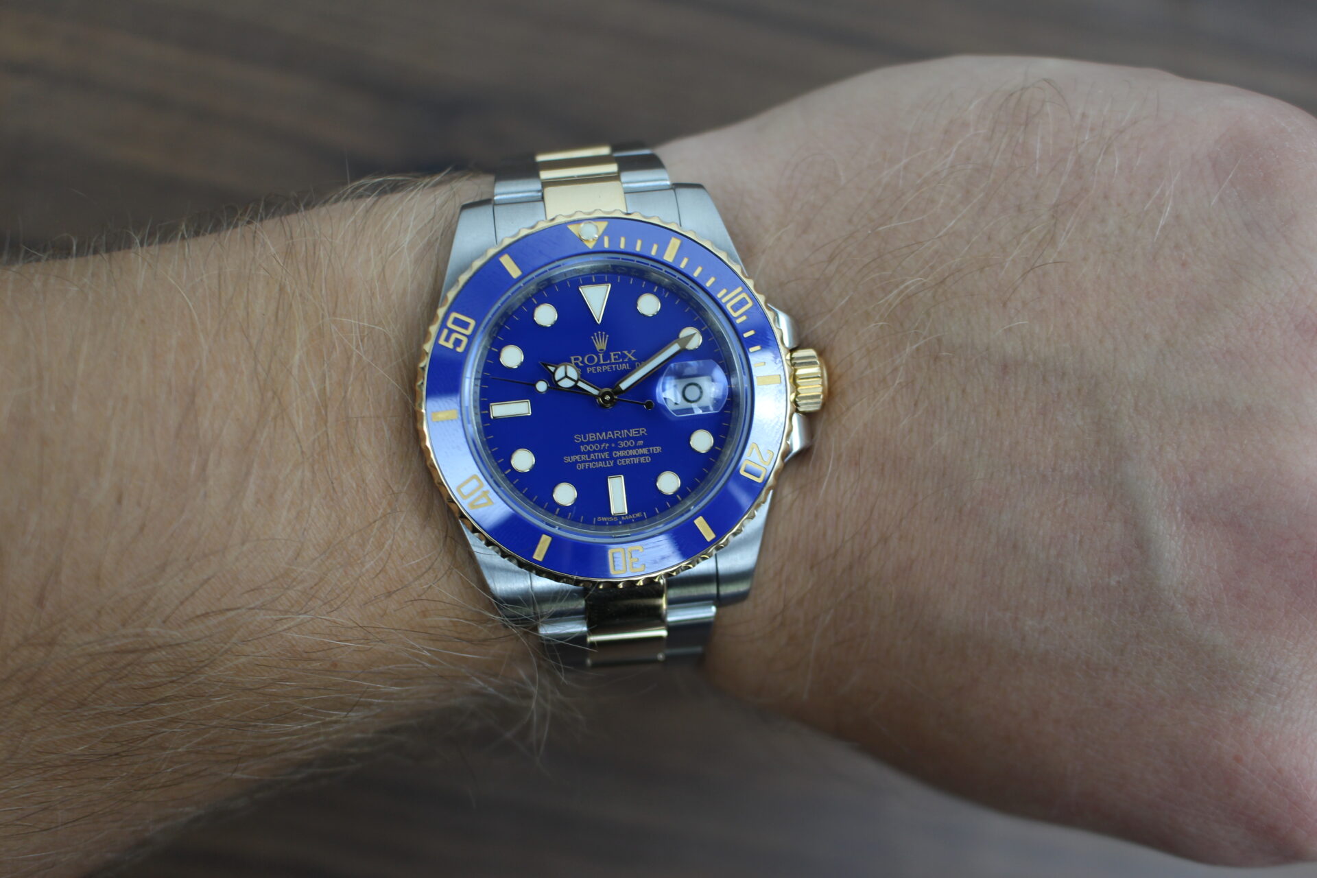 Rolex Submariner Bluesy 40mm 116613LB on a wrist