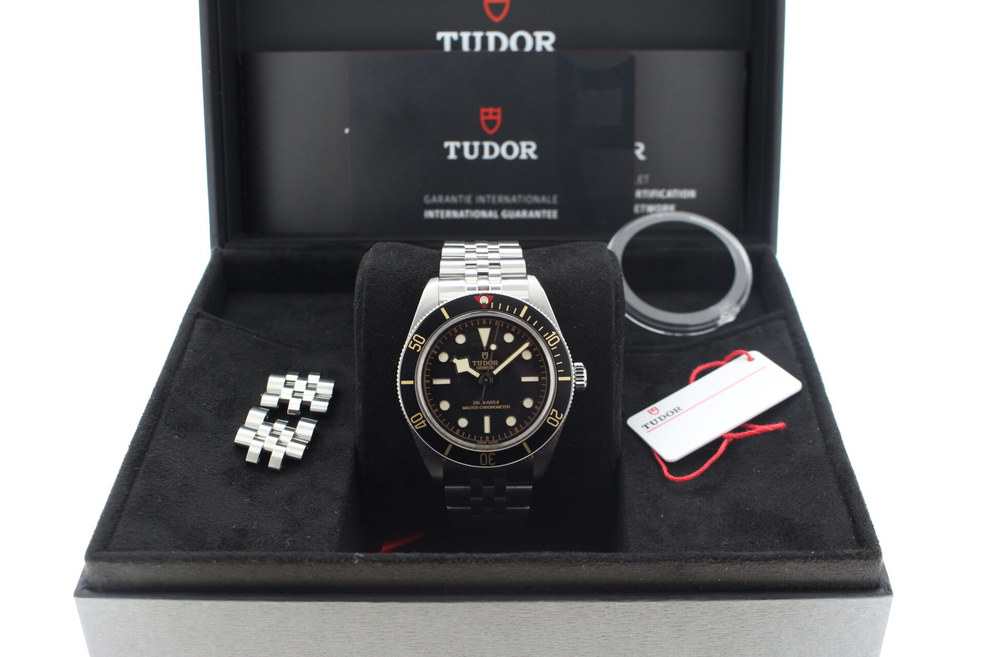 Tudor Black Bay 58 7939A1A0NU in it's box witth swing tags, bezel protector, links, booklet and warranty card
