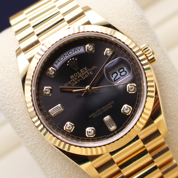 Rolex Day-Date 36 with the diamond dial displayed at an angle