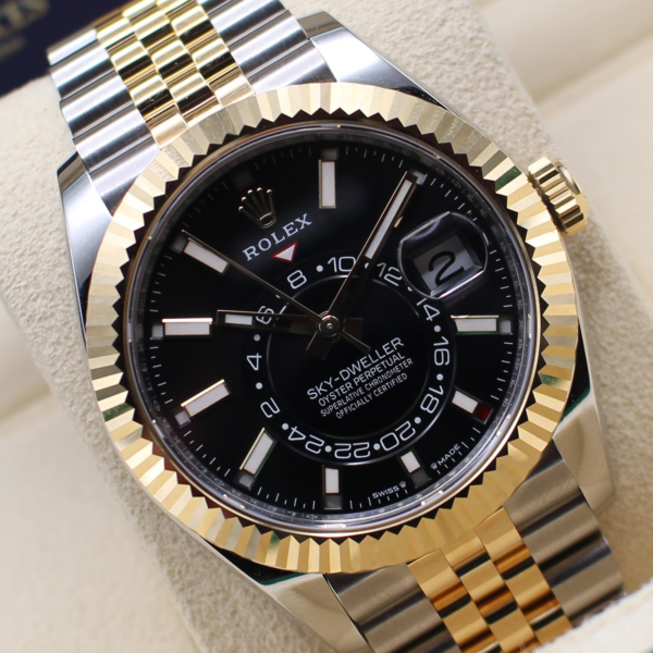 Rolex Sky-Dweller with black dial, tilted backwards on the cushion