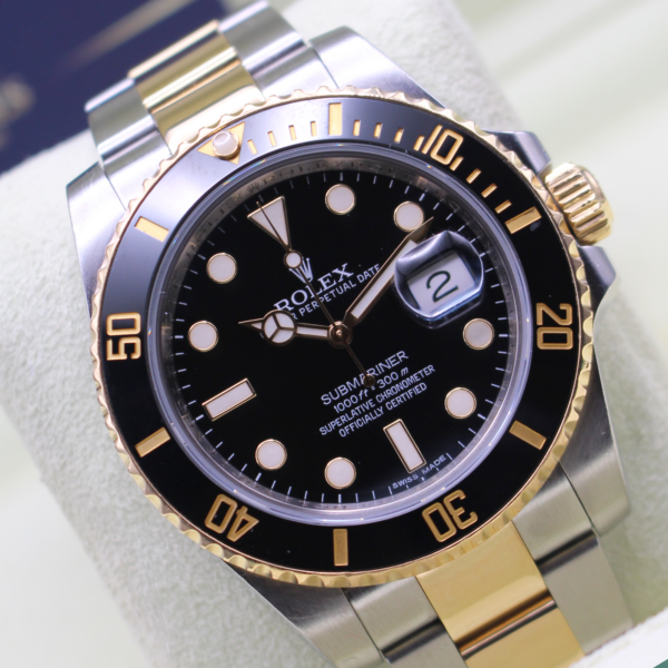 Rolex Submariner Bi-metal tilted on its cushfion