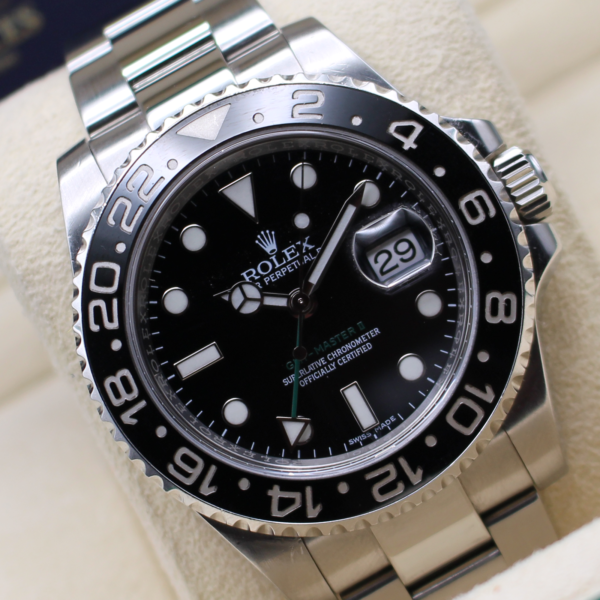 Rolex 116710LN at an angle reading 10 past 10