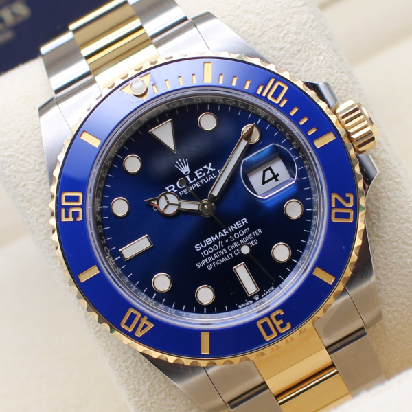 A Rolex Submariner Bluesy at a slight angle sat on its waytch cushion