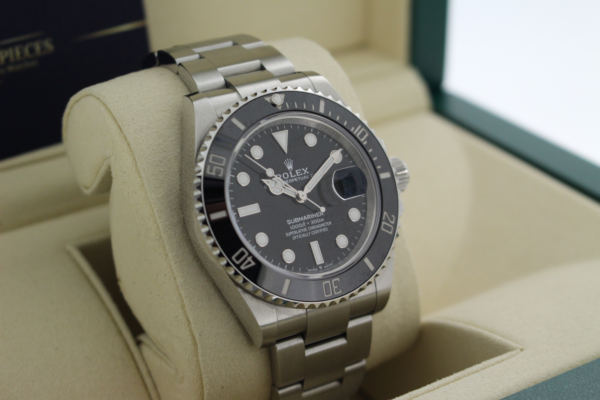 Rolex Submariner 126610LN in its box facing right, showing the left side