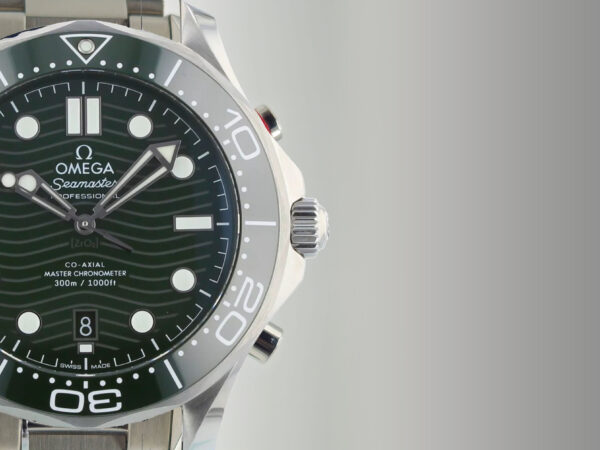 An Omega watch on a grey gradient background to represent the omega second hand watches uk from Solent Timepieces.