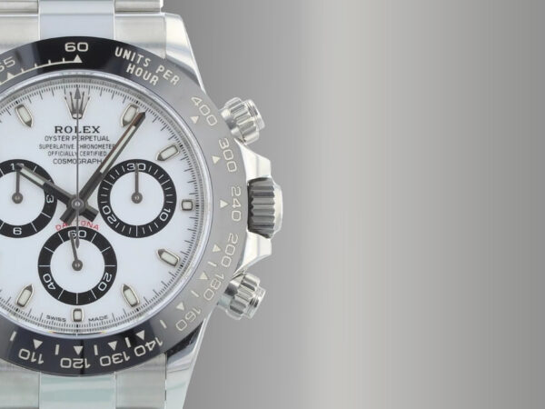 A Rolex watch on a grey gradient background. Solent Timepieces provide a variety of Rolex watches for men and women.